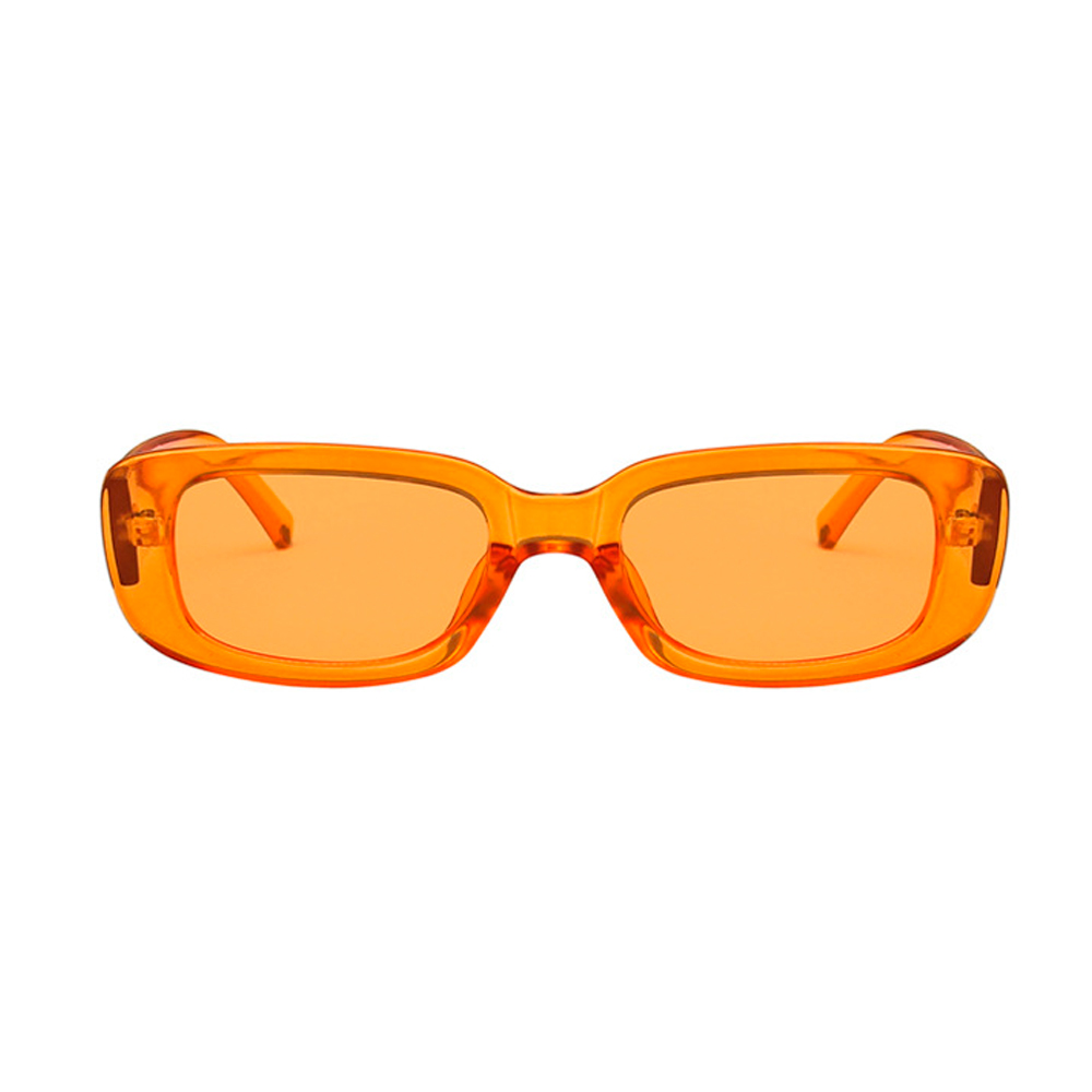  Fræk solbrille i aflangt firkantet design med bløde hjørner. Stellet er i en fræk Transparent orange med orange glas. | solbriller-farvet-glas-2