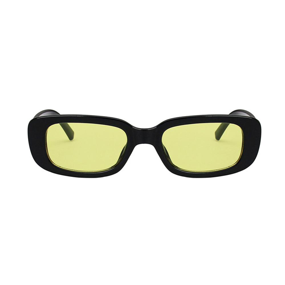  FrÃ¦k solbrille i aflangt firkantet design med blÃ¸de hjÃ¸rner. Stellet er i en fblank sort med gule glas.<br> | solbriller_kvinder-2
