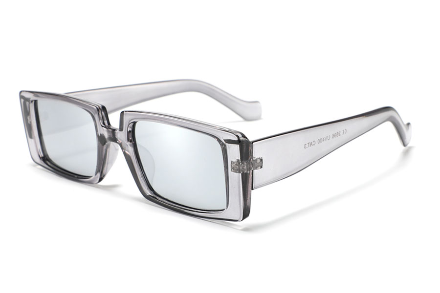 Firkantet aflang solbrille i transparent stel med let spejlglas. | firkantet-solbriller