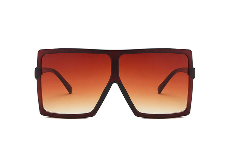 Stellet er halvtransparent i orange-brunt plastik i robust og god kvalitet. Glassene er lysebrune og giver lyst og behagelig udsyn gennem linserne | firkantet-solbriller-2