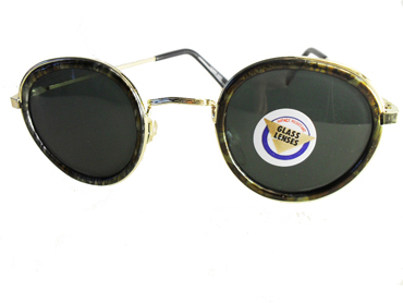 Fed rund moderigtig solbrille med kant i gul, grøn, brunlig skær. | search